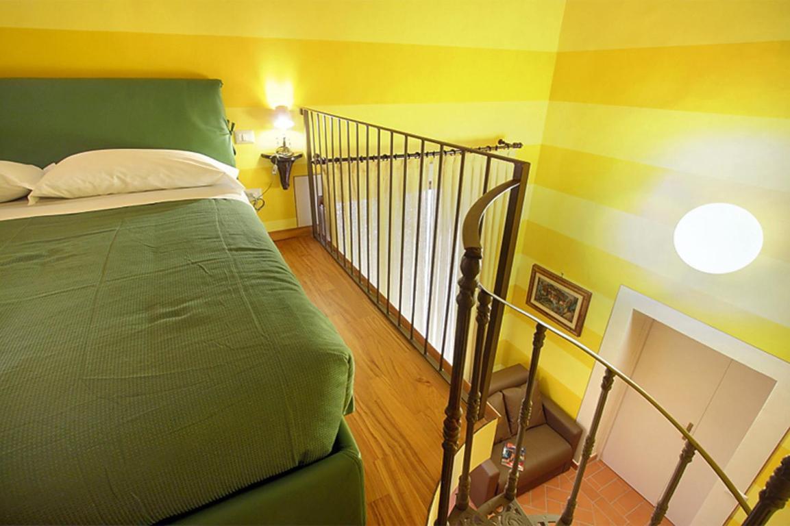 Apartments Puccini Florença Quarto foto